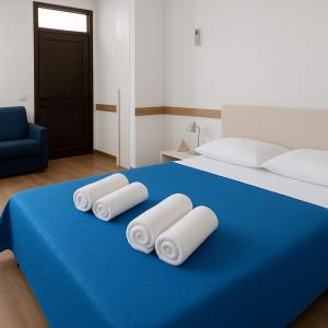A bed or beds in a room at Sogno d'estate