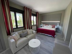Postel nebo postele na pokoji v ubytování Hotel Valjunco