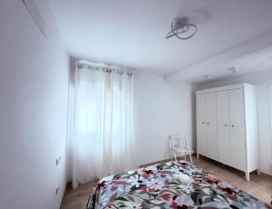 Cama o camas de una habitación en La casa de la playa