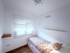 Cama o camas de una habitación en La casa de la playa
