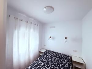 Cama o camas de una habitación en La casa de la playa