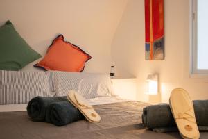 En eller flere senge i et værelse på Colmena 69 - City Center - Swimming pool + 39 billeder