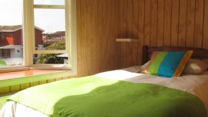 A bed or beds in a room at Cabañas Entre Parques