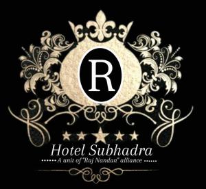 En logo, et sertifikat eller et firmaskilt på New Hotel subhadra