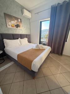 Voodi või voodid majutusasutuse Hotel Summer toas