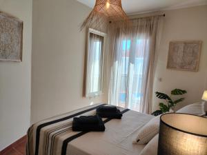 Posteľ alebo postele v izbe v ubytovaní Apartamento c/piscina centro Nerja