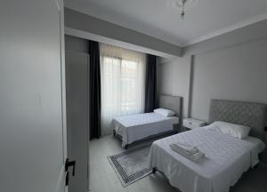 Ένα ή περισσότερα κρεβάτια σε δωμάτιο στο Villa Ayla +8 φωτογραφίες