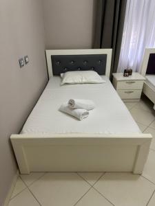 Postel nebo postele na pokoji v ubytování Villa Muar