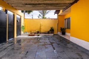 Φωτογραφία από το άλμπουμ του Casa espaçosa familiar com lindo jardim σε Πράια Γκράντε