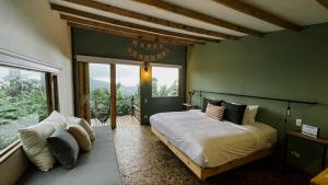 Postel nebo postele na pokoji v ubytování Hotel La Palma y El Tucán - Café y Naturaleza