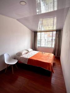 Postel nebo postele na pokoji v ubytování Kuyay Yachi Hostel + 37 fotografií