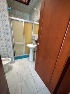 Koupelna v ubytování Kuyay Yachi Hostel