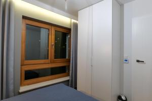 Posteľ alebo postele v izbe v ubytovaní Awanport B21