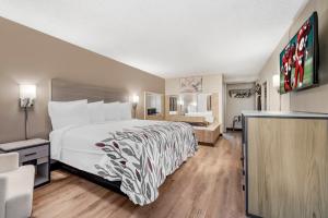 Letto o letti in una camera di Red Roof Inn Stroudsburg