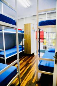 Ένα ή περισσότερα κρεβάτια σε δωμάτιο στο Hostel Pousada Central