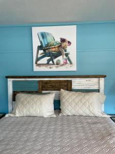 Ένα ή περισσότερα κρεβάτια σε δωμάτιο στο Cedar Key Turtle 132