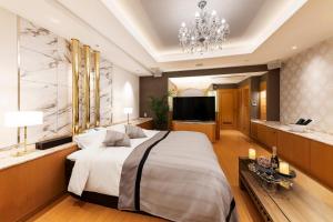 TV o dispositivi per l'intrattenimento presso Hotel MYTH-L&A-ホテル マイス エルアンドエー -adult only-