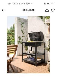 a black table with a tv on top of it at Paradise Ras Sudr Chalet in Ras Sedr