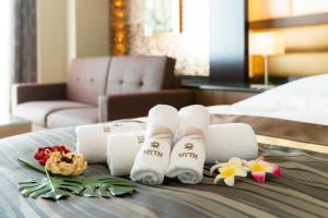 Letto o letti in una camera di Hotel MYTH-L&A-ホテル マイス エルアンドエー -adult only-