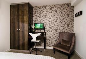 TV a/nebo společenská místnost v ubytování The Hide London