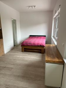 Postel nebo postele na pokoji v ubytování Modernes Apartment Himmelpforten + 3 fotografie
