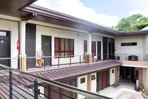 a view of a house with a balcony at Espacio de Clarita Hometel in Davao City