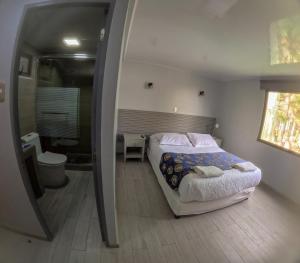 Letto o letti in una camera di Hotel Divasto