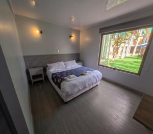 Letto o letti in una camera di Hotel Divasto