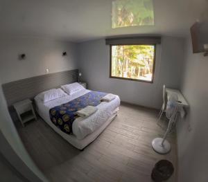 Letto o letti in una camera di Hotel Divasto