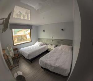 Letto o letti in una camera di Hotel Divasto