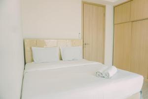 Postel nebo postele na pokoji v ubytování Spacious and Elegant 2BR with Private Lift at Hillcrest House Apartment By Travelio