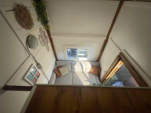 TV a/nebo společenská místnost v ubytování Tiny Casa