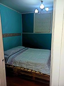 Postel nebo postele na pokoji v ubytování Casa Central + 4 fotografie