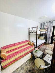 Letto o letti in una camera di Alsharif family