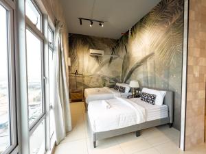 Katil atau katil-katil dalam bilik di Cozy Modern Home Mount Austin JB Miko Homestay