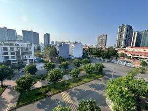 an aerial view of a city with tall buildings at I Riverside B303 I Compact & Quiet Studio in Ho Chi Minh City