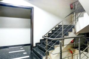Fotografie z fotogalerie ubytování Super Townhouse Oak Viman Nagar formerly Kuber Inn v destinaci Viman Nagar + 27 fotografií