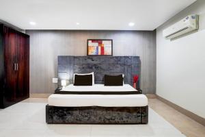 Postel nebo postele na pokoji v ubytování Townhouse Sector 122 Noida Formerly Hotel Zineb