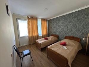 Letto o letti in una camera di Hotel-GVALA