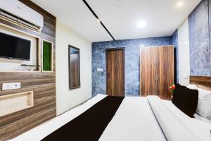 Postel nebo postele na pokoji v ubytování Super Townhouse Haibowal Chowk