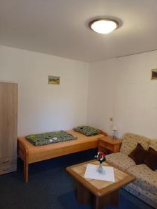 Posteľ alebo postele v izbe v ubytovaní Apartmán Bokova chata