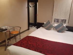 Postel nebo postele na pokoji v ubytování Hotel Moana Otsuka (Adult Only)