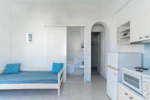 Kuchyň nebo kuchyňský kout v ubytování Theo Studios & Apartments + 26 fotografií