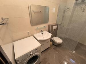 Koupelna v ubytování Apartment Knez + 30 fotografií