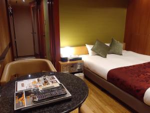 Postel nebo postele na pokoji v ubytování Hotel Moana Otsuka (Adult Only)