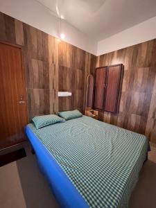 Ένα ή περισσότερα κρεβάτια σε δωμάτιο στο saihomestay +3 φωτογραφίες