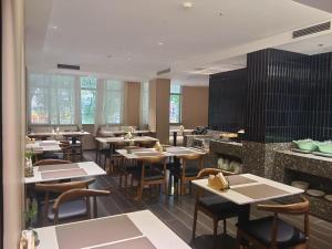 Restaurace v ubytování Paco Hotel Tianhe Coach Terminal Metro Satation Guangzhou-Free Shuttle Bus for Canton Fair
