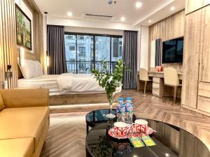 Et tv og/eller underholdning på G-Apartment & Hotel