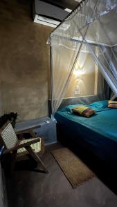 Postel nebo postele na pokoji v ubytování Kataragama Homestay