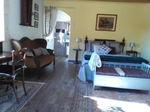 Postel nebo postele na pokoji v ubytování Bergerie de Lagarrigue